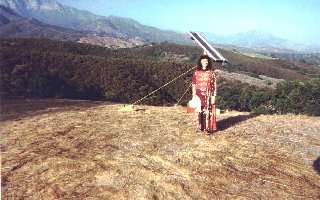 [photo: Author and solar collector at Ojai Foundation]